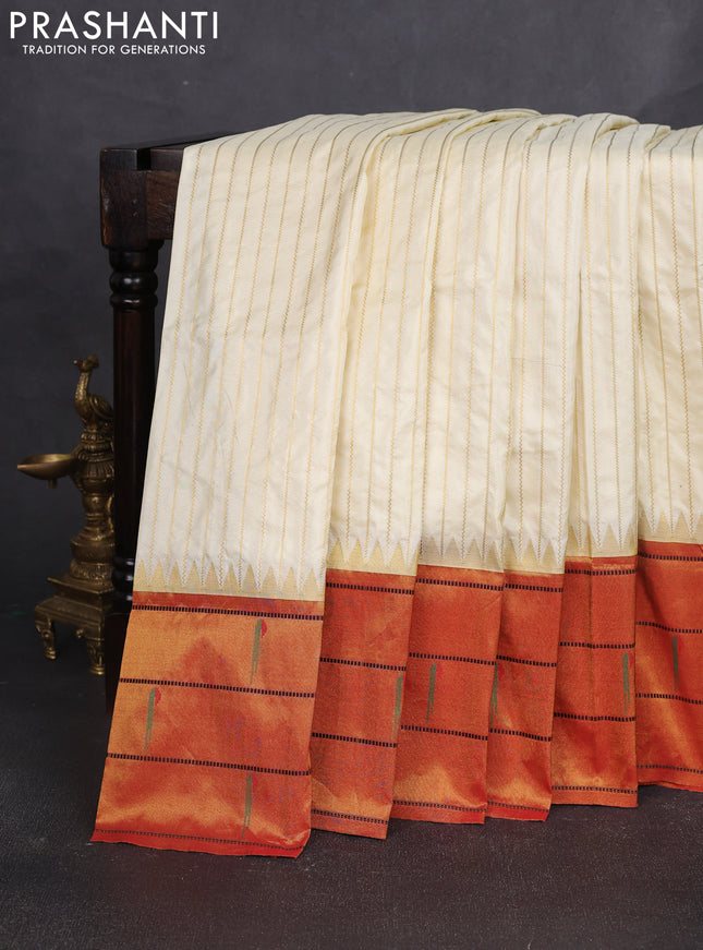 Pure paithani silk saree cream and red with allover zari weaves and zari woven muniya butta border