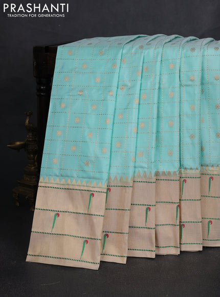 Pure paithani silk saree teal blue and cream with allover zari checks & buttas and long zari woven muniya butta border