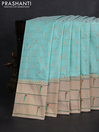 Pure paithani silk saree teal blue and cream with allover zari checks & buttas and long zari woven muniya butta border