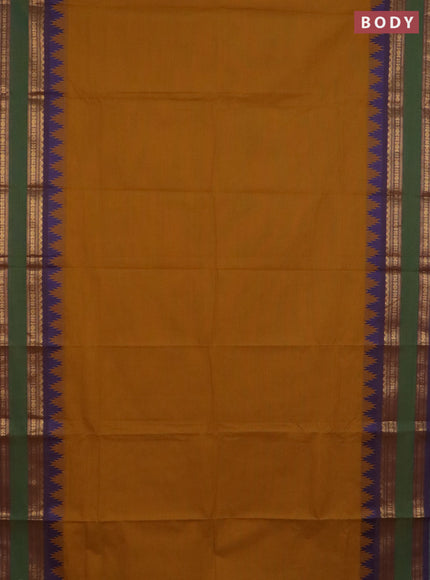 Chettinad cotton saree dark mustard and violet with plain body and temple design rettapet zari woven border