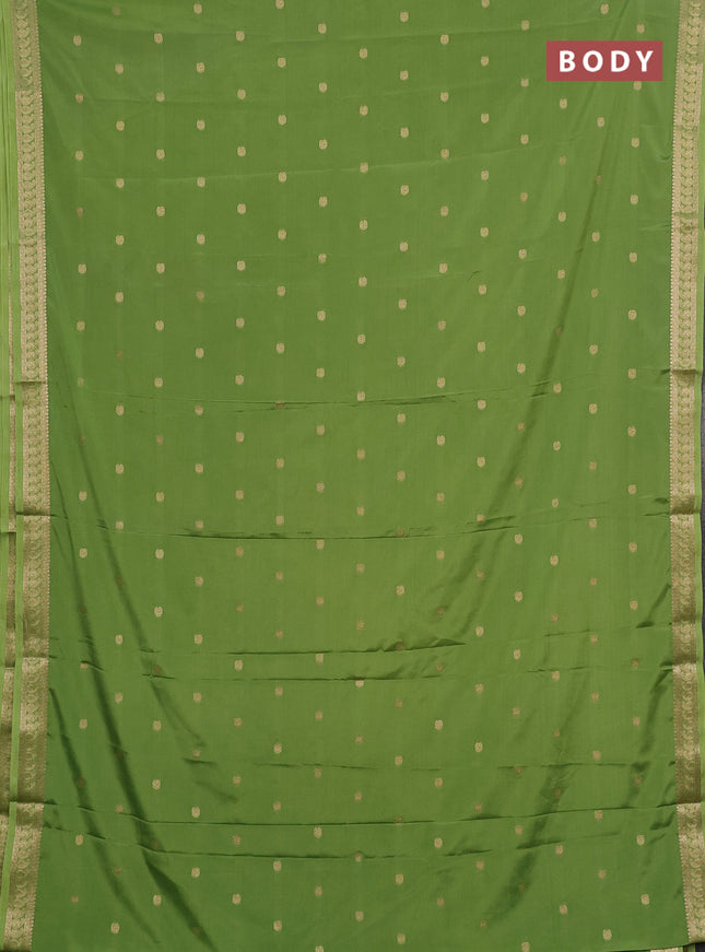 Semi mysore silk saree light green with allover paisley zari woven buttas and zari woven border