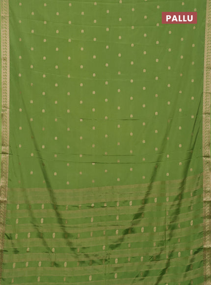 Semi mysore silk saree light green with allover paisley zari woven buttas and zari woven border