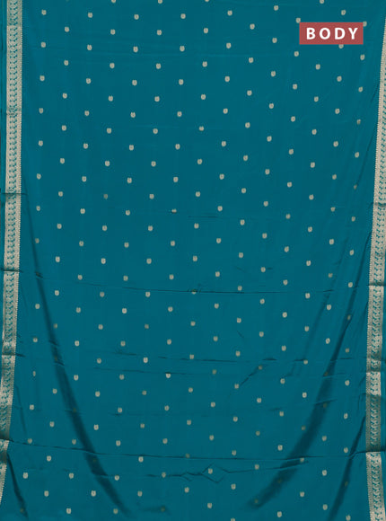 Semi mysore silk saree teal green with allover paisley zari woven buttas and zari woven border