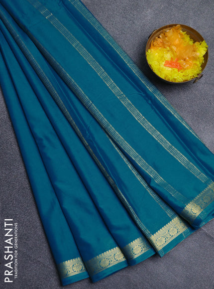Semi mysore silk saree peacock blue and  with plain body and zari woven border