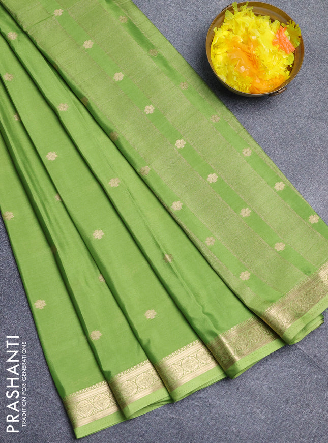 Semi mysore silk saree light green with allover zari woven buttas and zari woven border