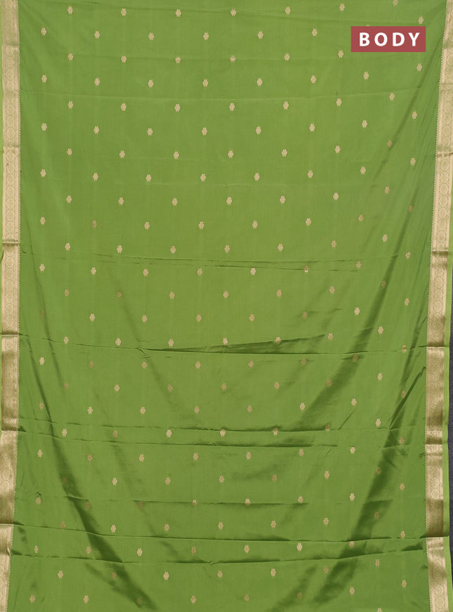 Semi mysore silk saree light green with allover zari woven buttas and zari woven border
