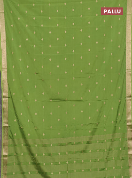 Semi mysore silk saree light green with allover zari woven buttas and zari woven border
