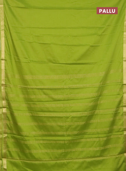 Semi mysore silk saree light green with plain body and zari woven border