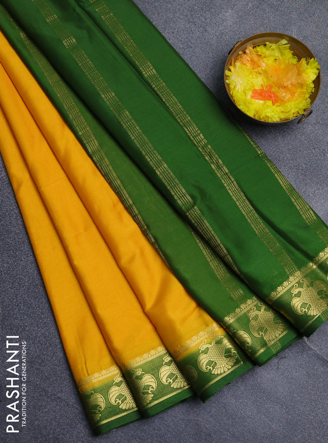 Semi mysore silk saree yellow and light green with plain body and zari woven border