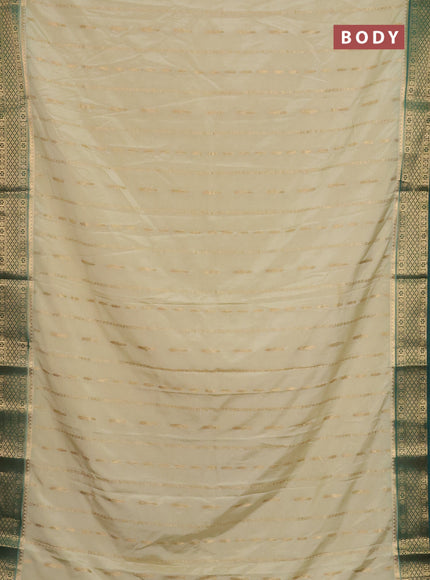 Semi mysore silk saree cream and green with allover zari weaves and zari woven border