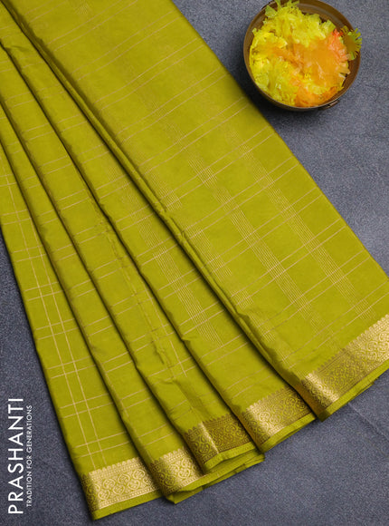 Semi mysore silk saree light green with allover checked pattern and zari woven border