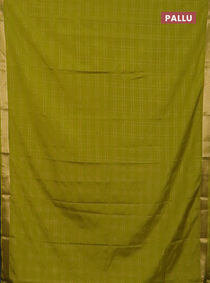 Semi mysore silk saree light green with allover checked pattern and zari woven border