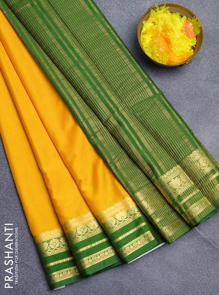 Semi mysore silk saree yellow and light green with plain body and zari woven border