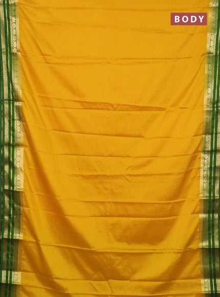 Semi mysore silk saree yellow and light green with plain body and zari woven border