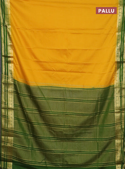 Semi mysore silk saree yellow and light green with plain body and zari woven border