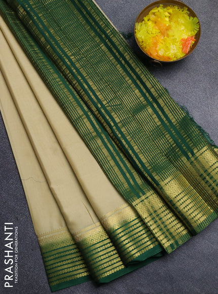 Semi mysore silk saree cream and green with plain body and zari woven border