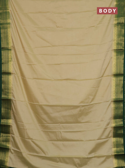 Semi mysore silk saree cream and green with plain body and zari woven border
