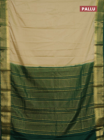 Semi mysore silk saree cream and green with plain body and zari woven border