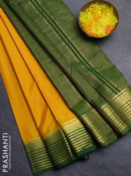 Semi mysore silk saree yellow and green with plain body and zari woven border