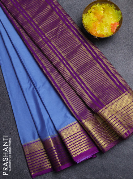 Semi mysore silk saree pastel blue and purple with plain body and zari woven border