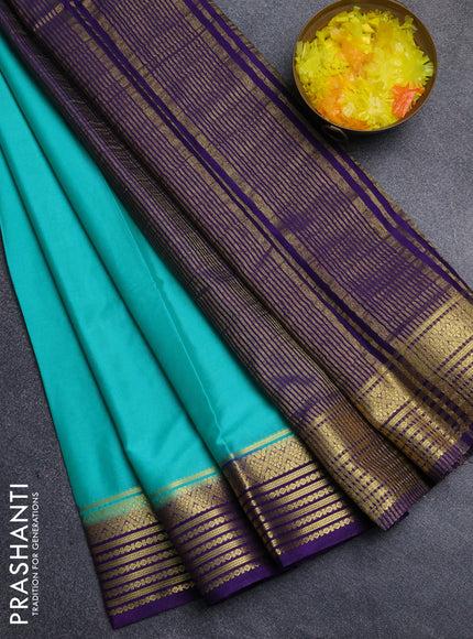 Semi mysore silk saree teal green and violet with plain body and zari woven border