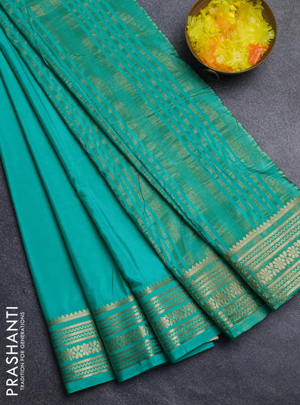 Semi mysore silk saree teal green with plain body and zari woven border