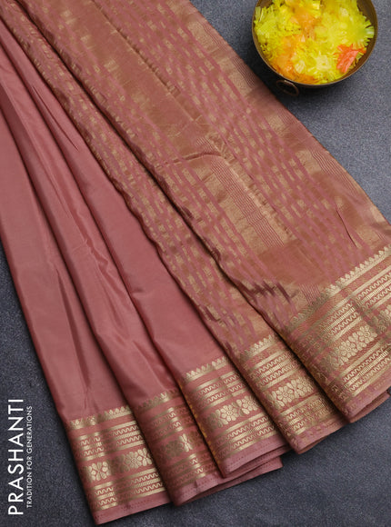 Semi mysore silk saree dark peach with plain body and zari woven border