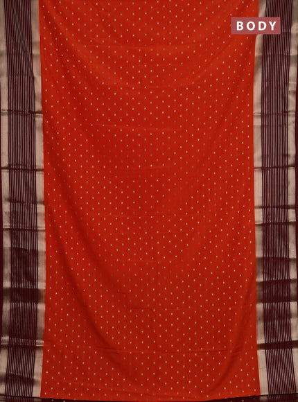 Semi mysore silk saree orange and maroon with allover zari woven buttas and long zari woven border