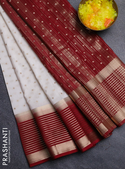 Semi mysore silk saree off white and maroon with allover zari woven buttas and long zari woven border