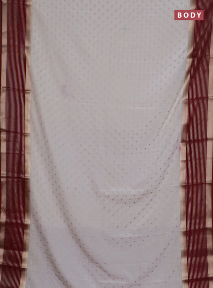 Semi mysore silk saree off white and maroon with allover zari woven buttas and long zari woven border