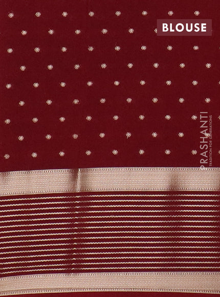 Semi mysore silk saree off white and maroon with allover zari woven buttas and long zari woven border