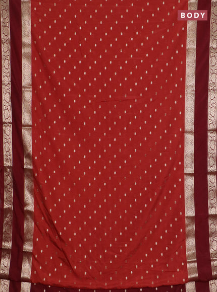 Semi mysore silk saree rustic orange and maroon with allover zari woven buttas and long rettapet zari woven border