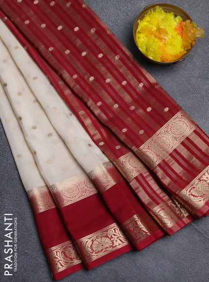 Semi mysore silk saree off white and maroon with allover zari woven buttas and long rettapet zari woven border