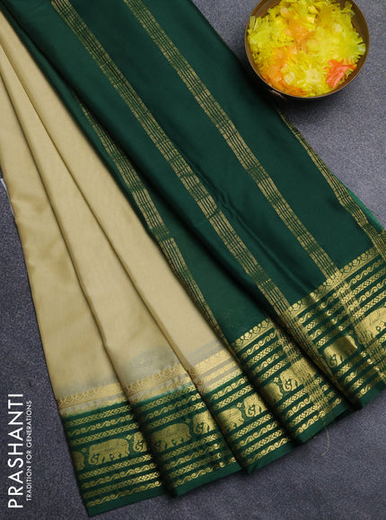Semi mysore silk saree cream and bottle green with plain body and zari woven border