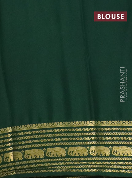 Semi mysore silk saree cream and bottle green with plain body and zari woven border