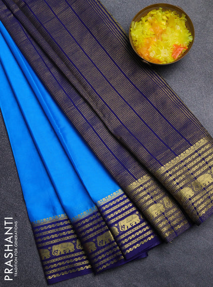 Semi mysore silk saree teal blue and navy blue with plain body and zari woven border