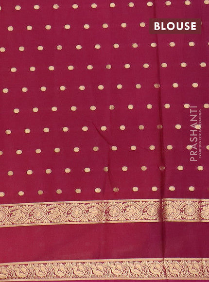 Semi mysore silk saree orange and purple with allover zari woven buttas and long rettapet zari woven border