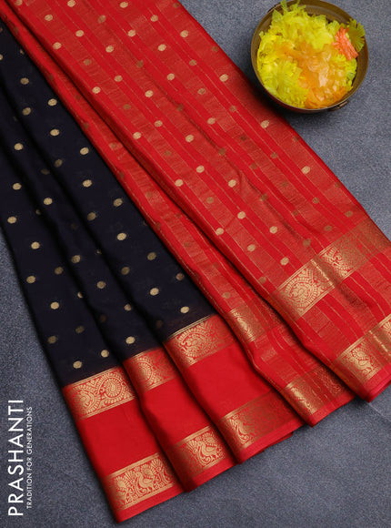 Semi mysore silk saree black and orange with allover zari woven buttas and long rettapet zari woven border