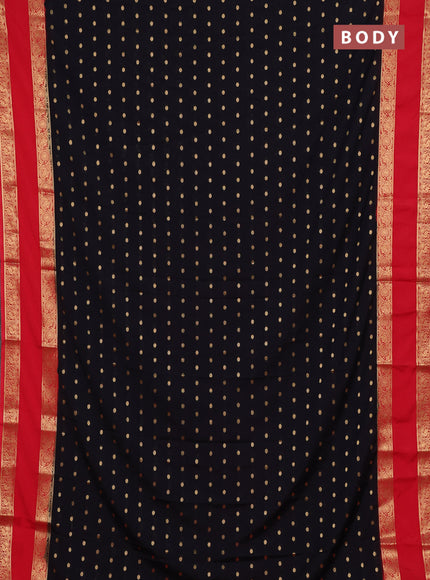 Semi mysore silk saree black and orange with allover zari woven buttas and long rettapet zari woven border