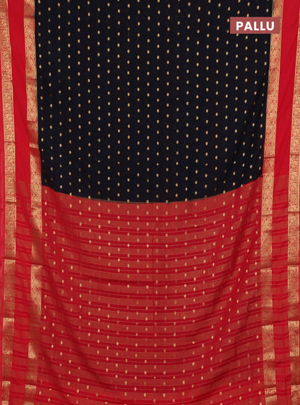 Semi mysore silk saree black and orange with allover zari woven buttas and long rettapet zari woven border