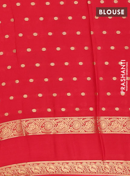 Semi mysore silk saree black and orange with allover zari woven buttas and long rettapet zari woven border