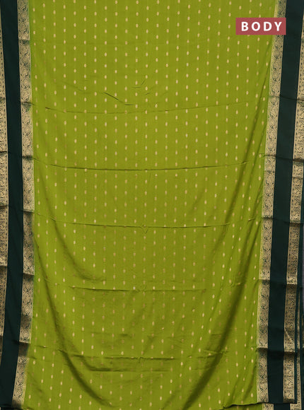 Semi mysore silk saree light green and bottle green with allover zari woven buttas and long rettapet zari woven border