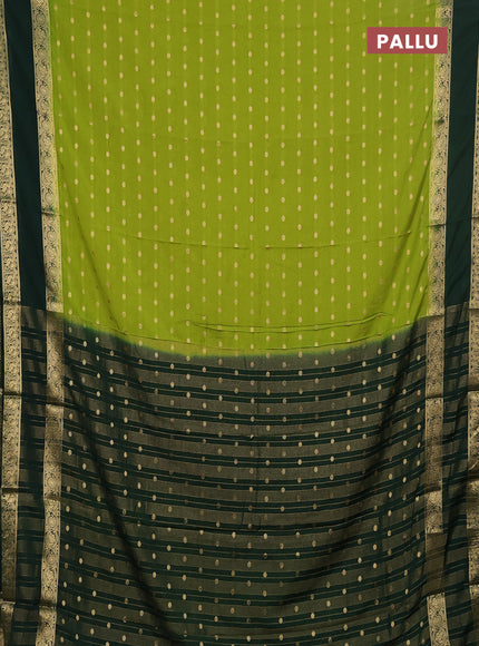 Semi mysore silk saree light green and bottle green with allover zari woven buttas and long rettapet zari woven border