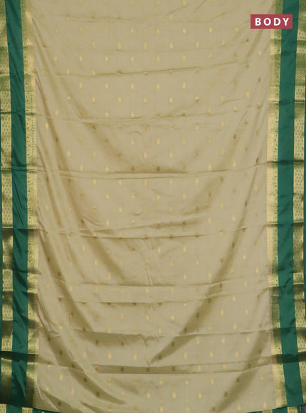 Semi mysore silk saree cream and light green with allover zari woven buttas and rettapet zari woven border