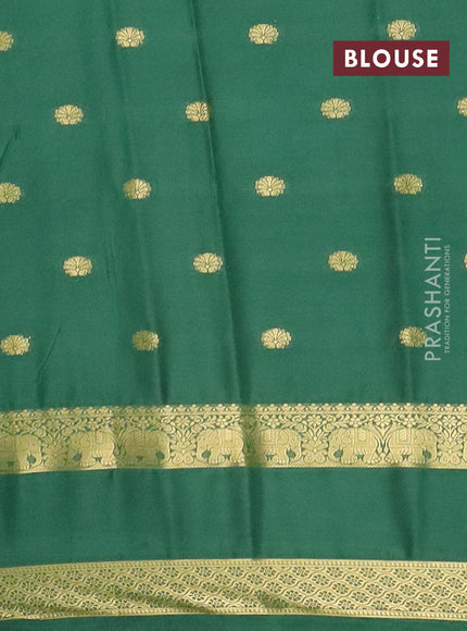 Semi mysore silk saree cream and light green with allover zari woven buttas and rettapet zari woven border