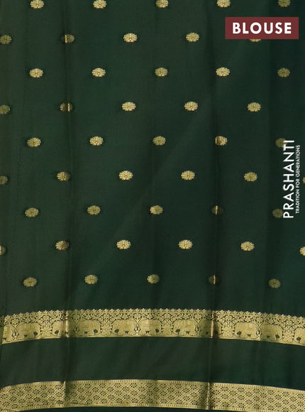 Semi mysore silk saree cream and bottle green with allover zari woven buttas and rettapet zari woven border