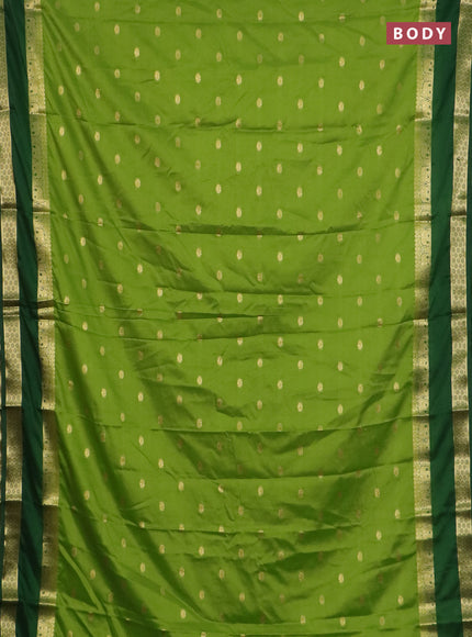 Semi mysore silk saree light green and green with allover zari woven buttas and rettapet zari woven border