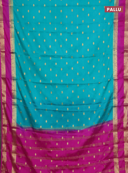 Semi mysore silk saree teal green and pink with allover zari woven buttas and rettapet zari woven border