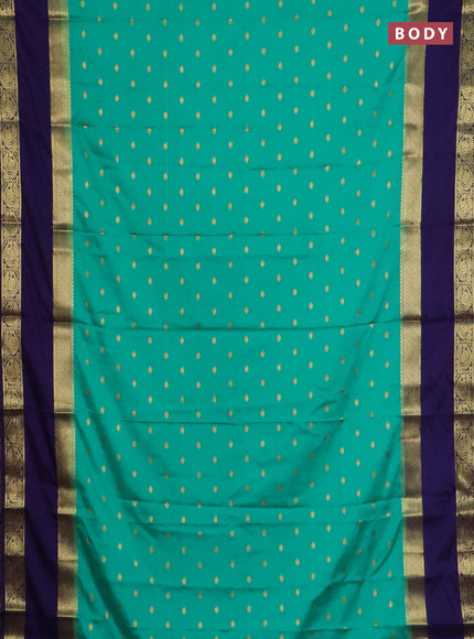 Semi mysore silk saree teal green and violet with allover zari woven buttas and long rettapet zari woven border
