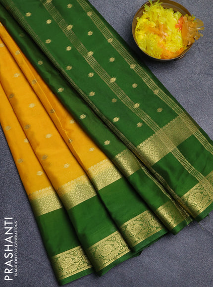 Semi mysore silk saree yellow and light green with allover zari woven buttas and long rettapet zari woven border